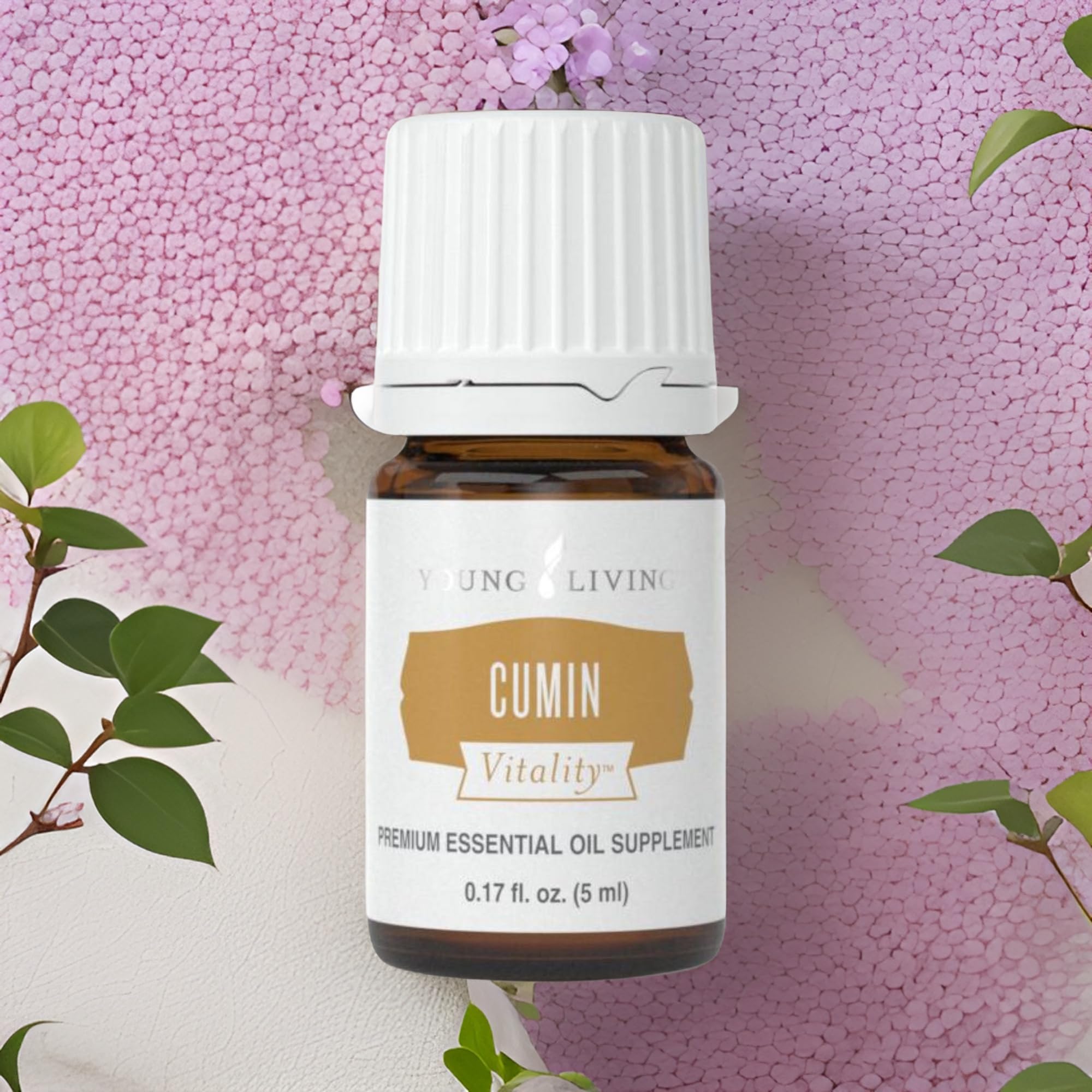 Young Living Cumin Vitality oil drop added to tea for aroma and subtle flavor.