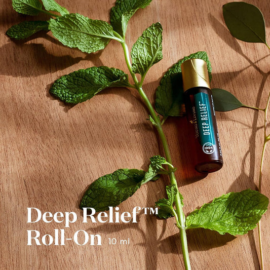 Hands applying Deep Relief Roll-On to neck