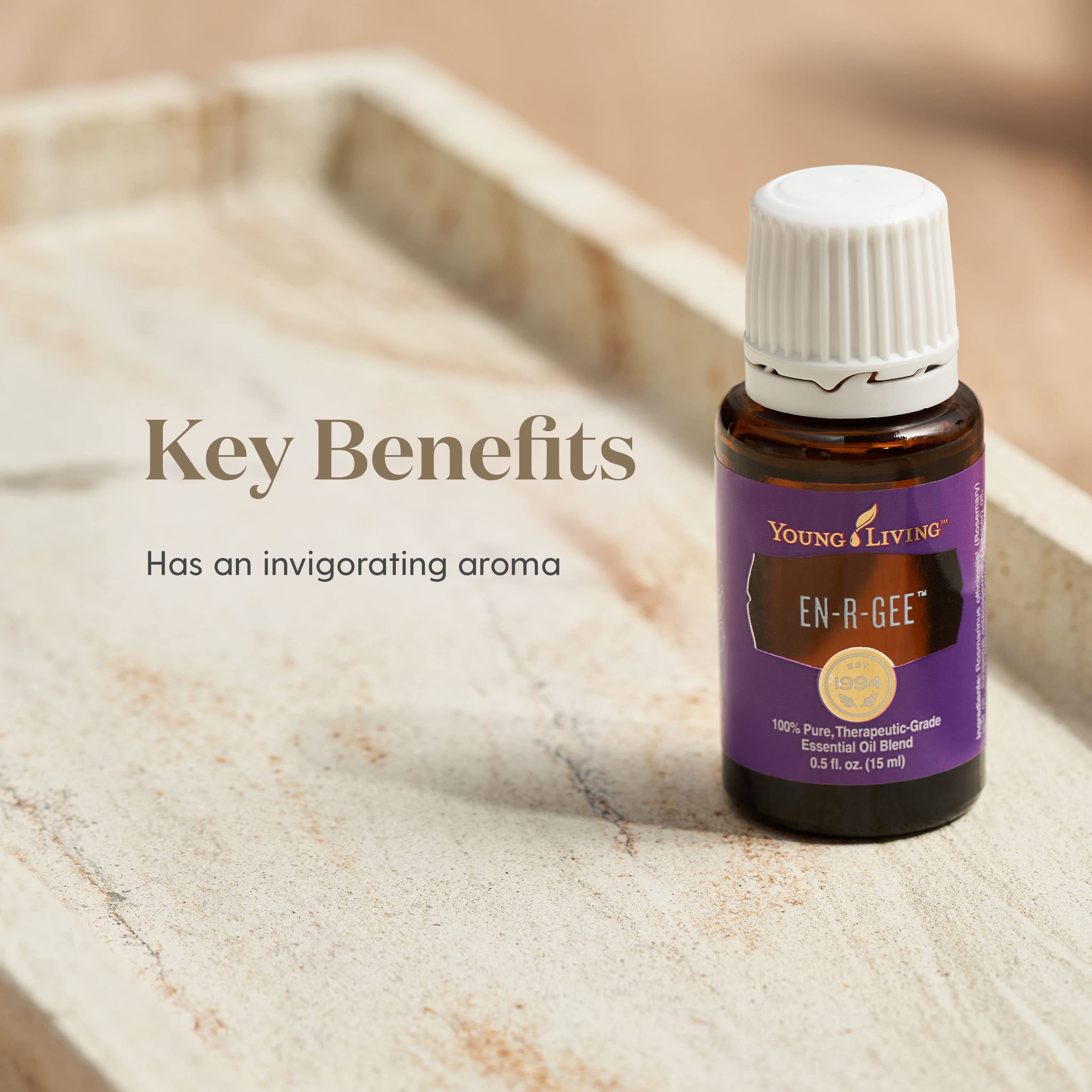 Young Living En-R-Gee application on wrist for quick alertness.
