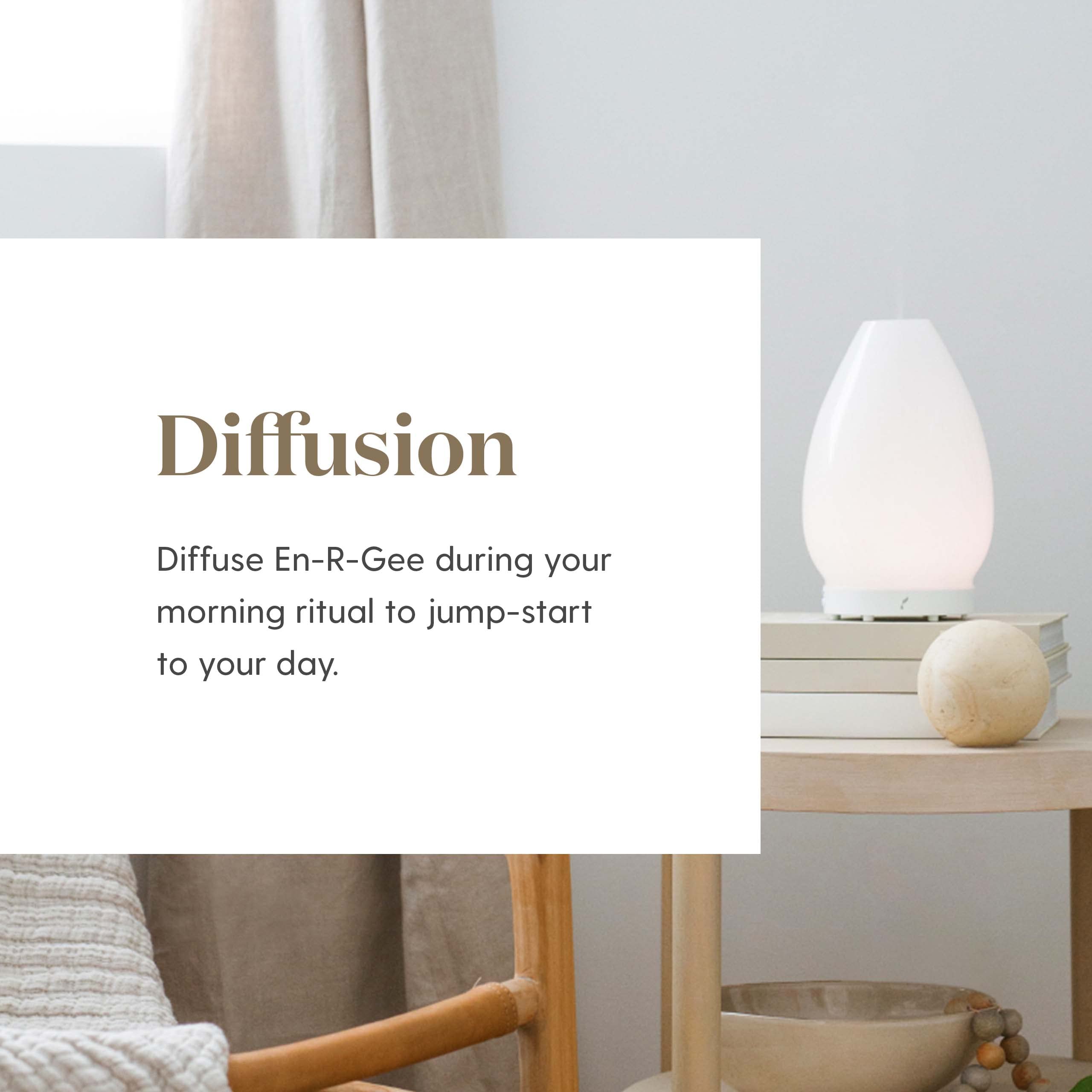 Young Living En-R-Gee diffuser mist creating an uplifting energy ambiance.
