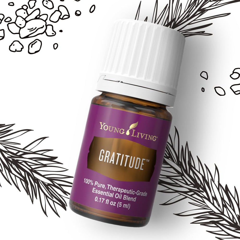Young Living Gratitude botanicals backdrop emphasizes plant-based ingredients.