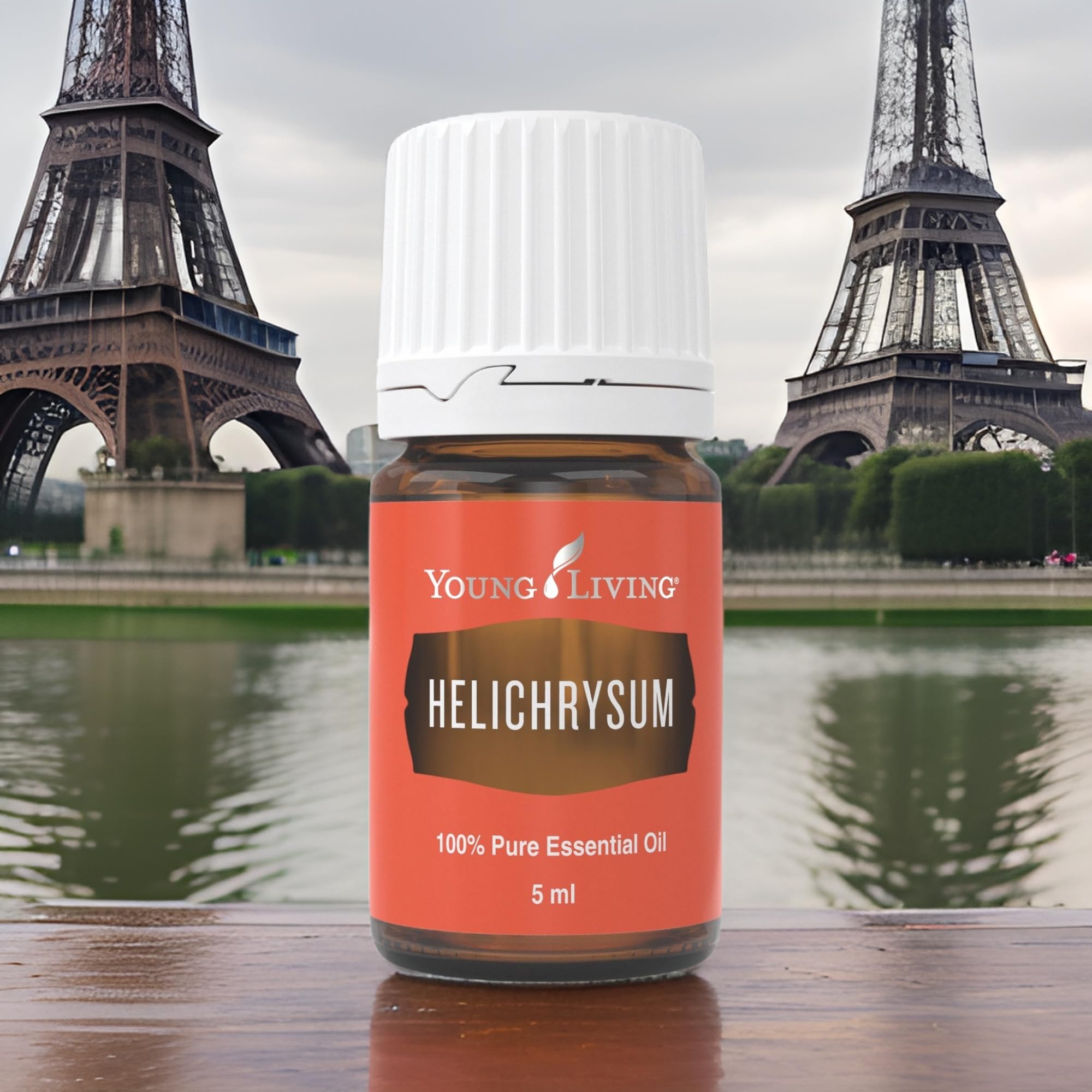 Young Living Helichrysum bottle pour illustrates ease of topical or aromatic use