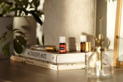Young Living Helichrysum drops diffuser image indicates calming aroma in space