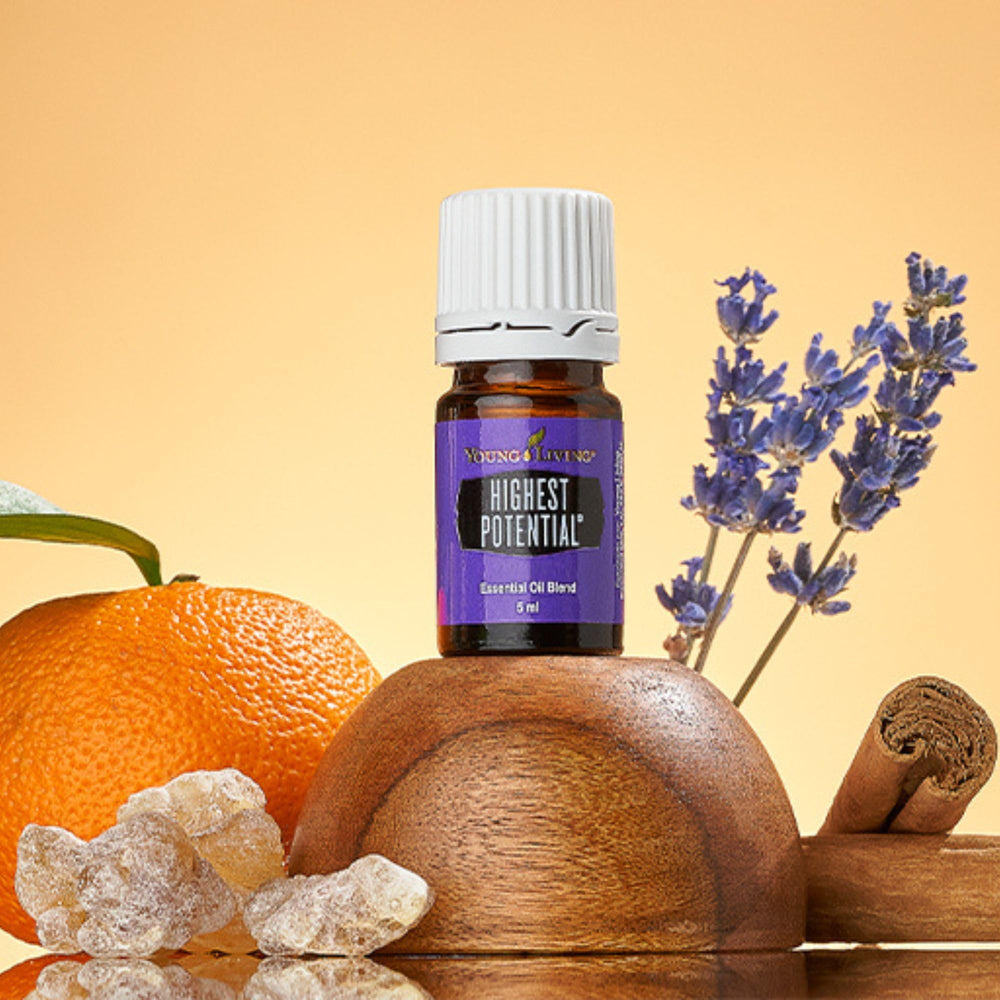 Young Living Highest Potential oil being applied topically for a calming ritual.