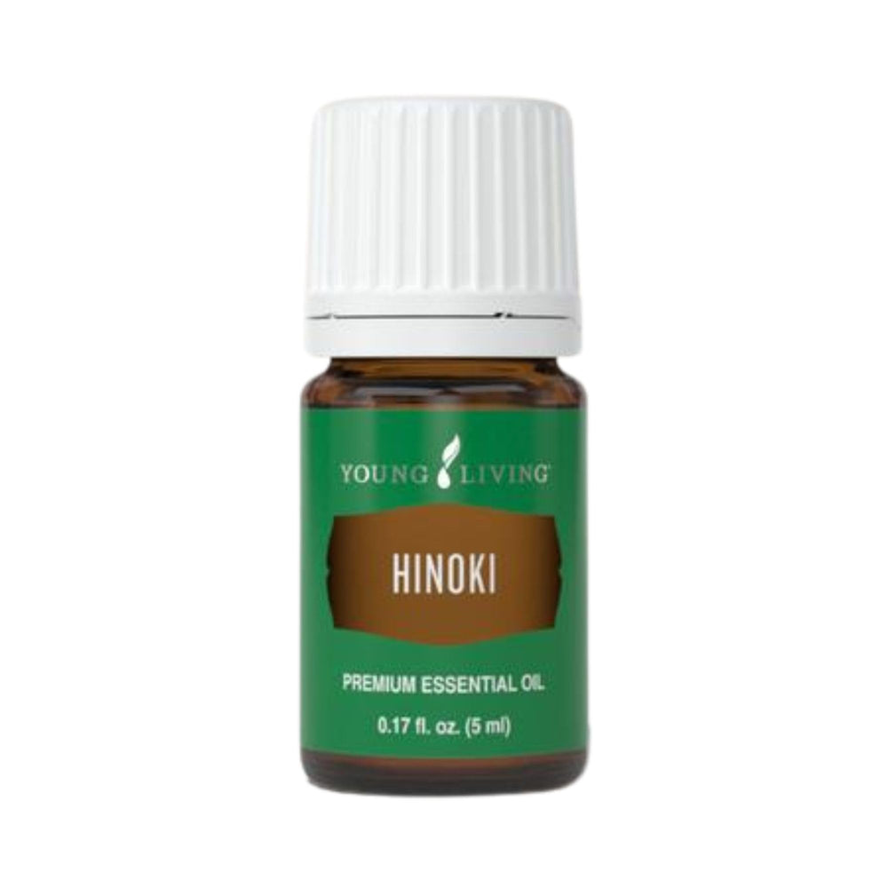Young Living Hinoki 5ml bottle closeup for a calming, refreshing ambiance.