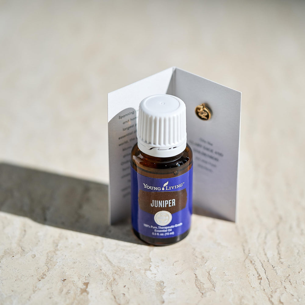 Young Living juniper essential oil relaxation moment during yoga.