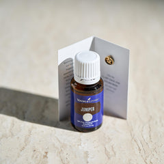 Young Living juniper essential oil relaxation moment during yoga.