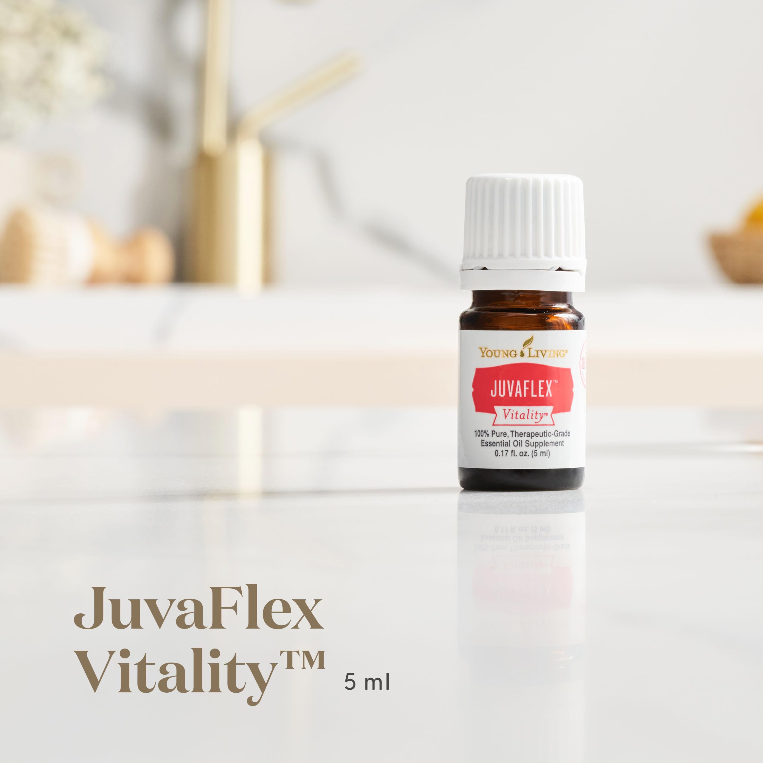 Young Living JuvaFlex Vitality in glass water conveys convenient consumption as part of daily health routine.