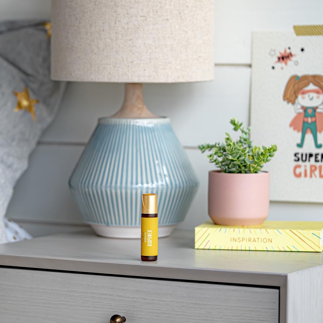 Young Living KidPower roll-on packaging shown as a compact child-friendly design.