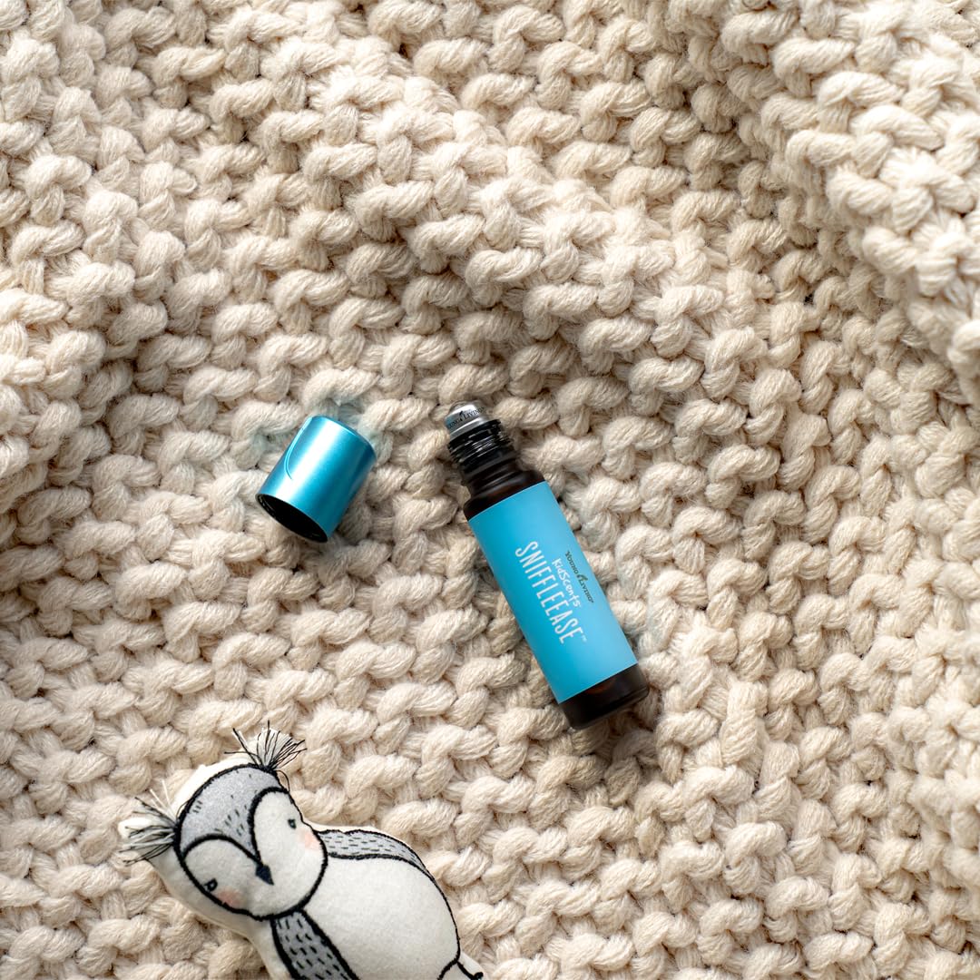 Young Living KidScents SniffleEase travel-pack demonstrates compact size for pockets.