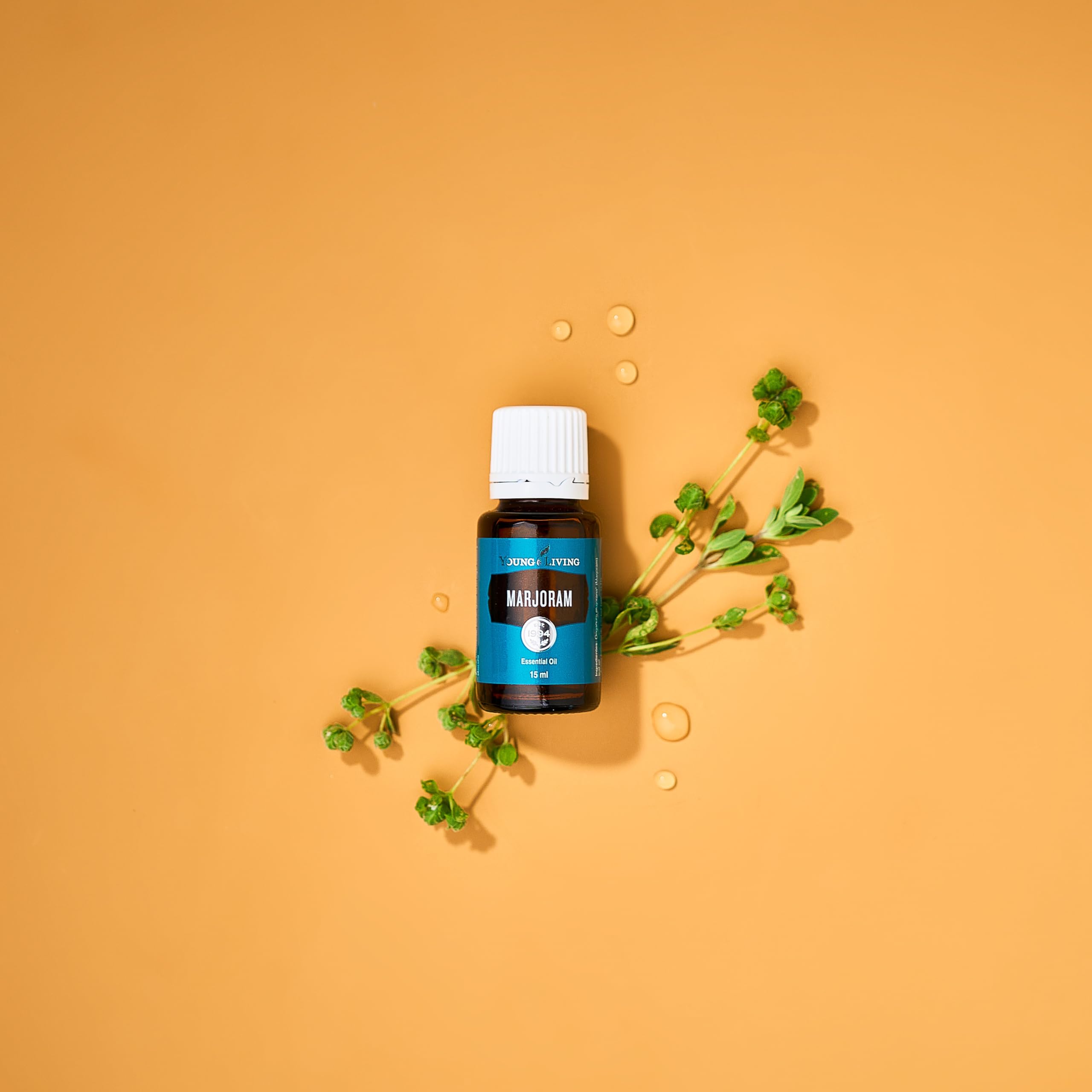 Young Living Marjoram essential oil diffuser aroma swirling for calm