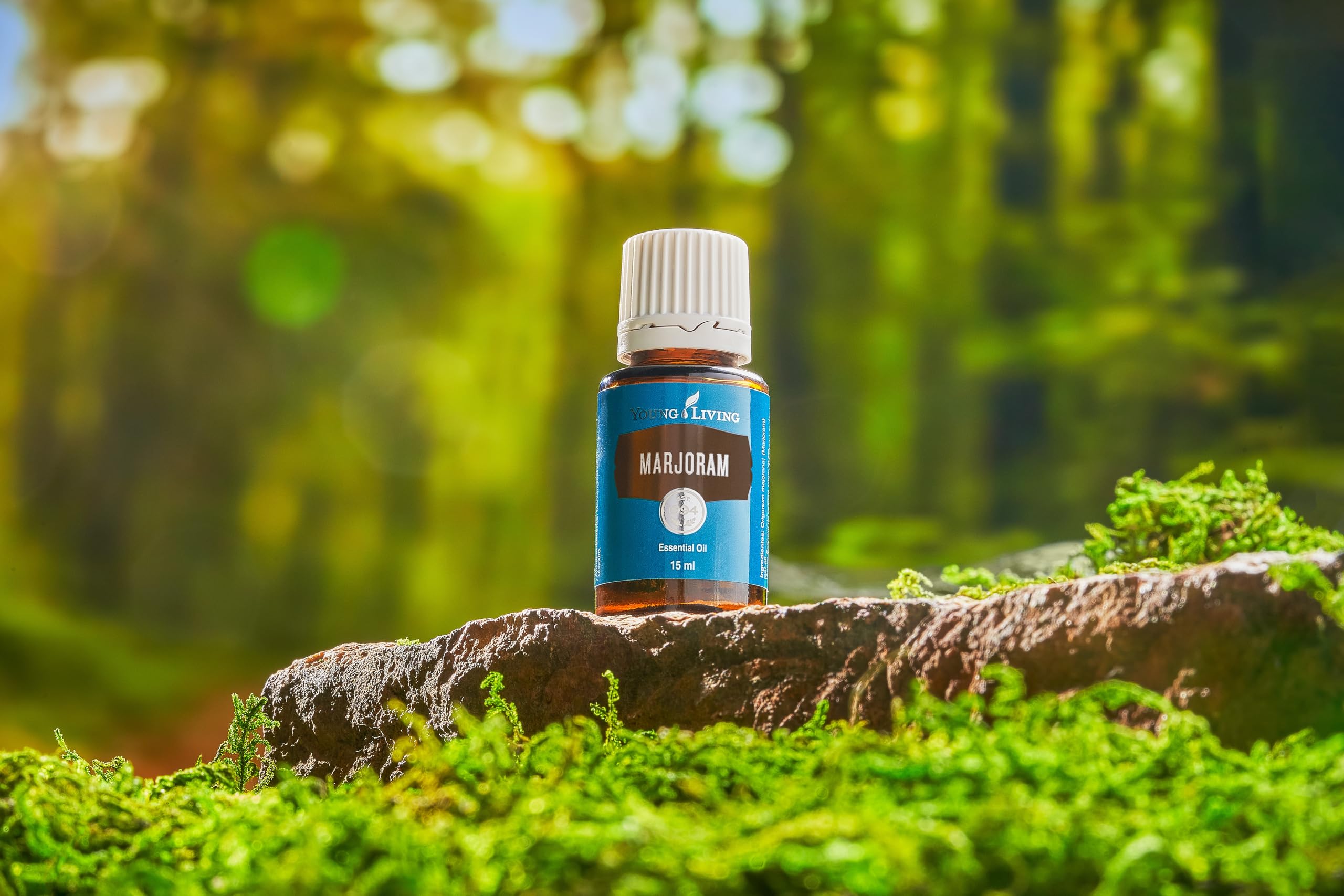 Young Living Marjoram relaxation scene with candle and diffuser