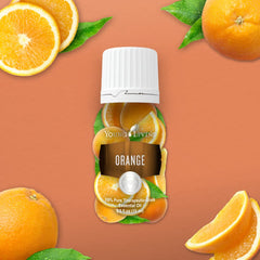 Orange slices with essential oil bottle