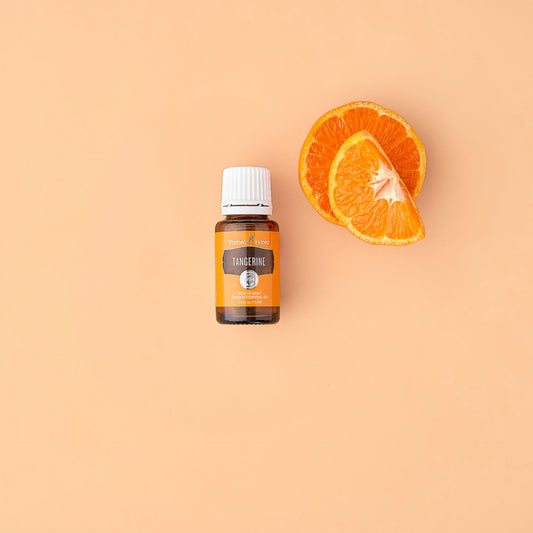 Diffuser releasing Young Living Tangerine aroma to refresh room air