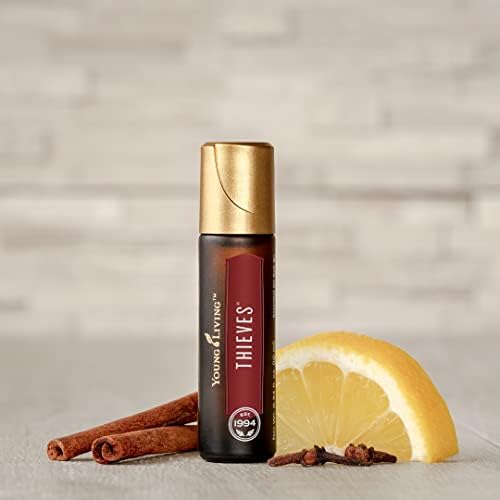 Close-up of essential oils: Clove, Lemon, Cinnamon Bark, Eucalyptus, Rosemary