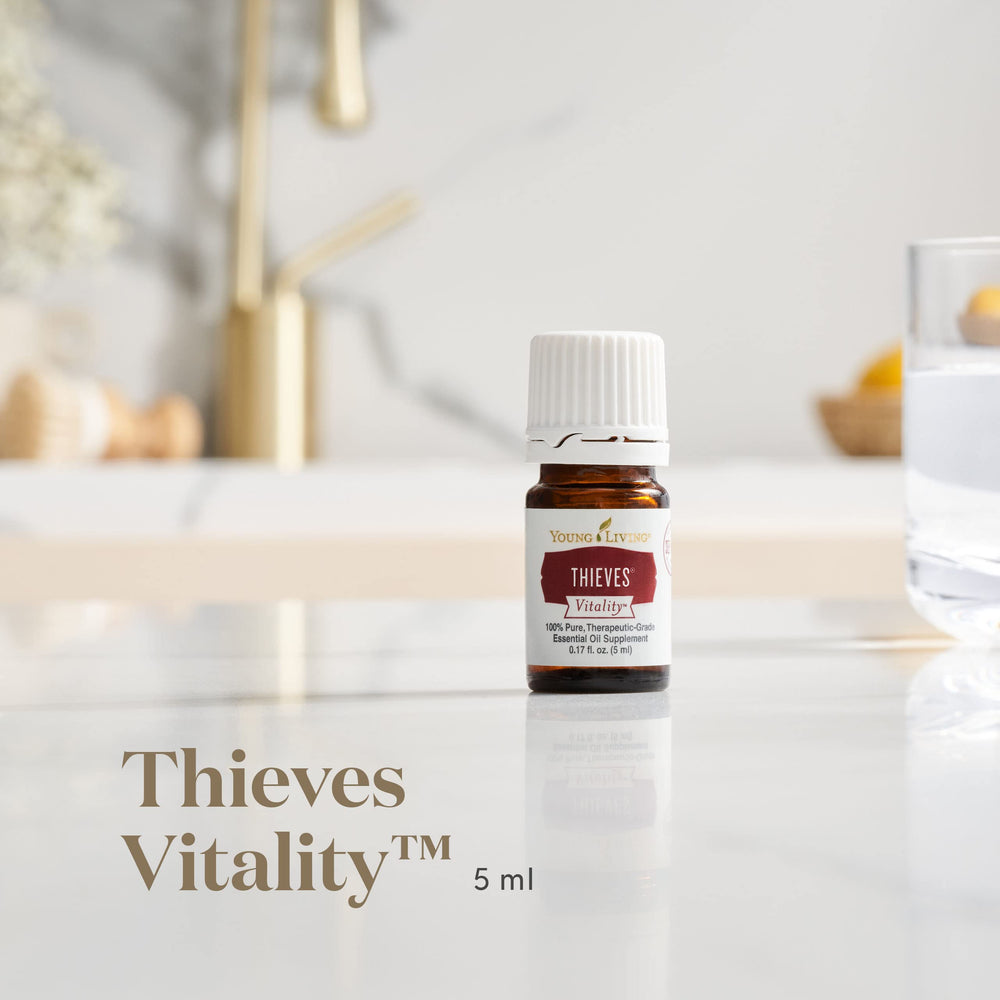 Close-up of Thieves Vitality label on a 5 mL bottle
