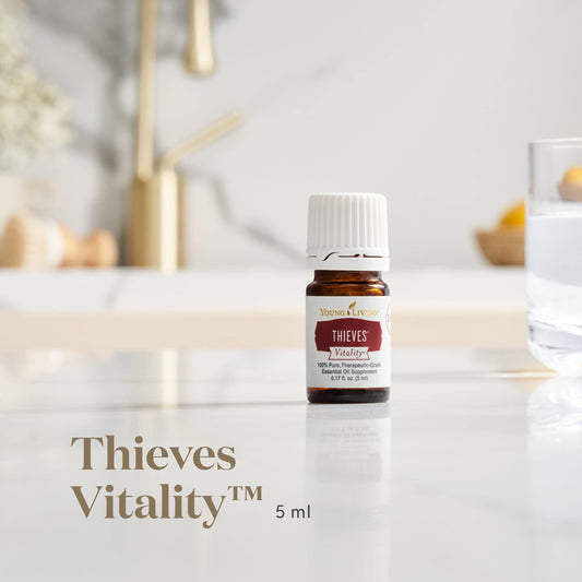 Close-up of Thieves Vitality label on a 5 mL bottle