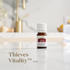 Close-up of Thieves Vitality label on a 5 mL bottle