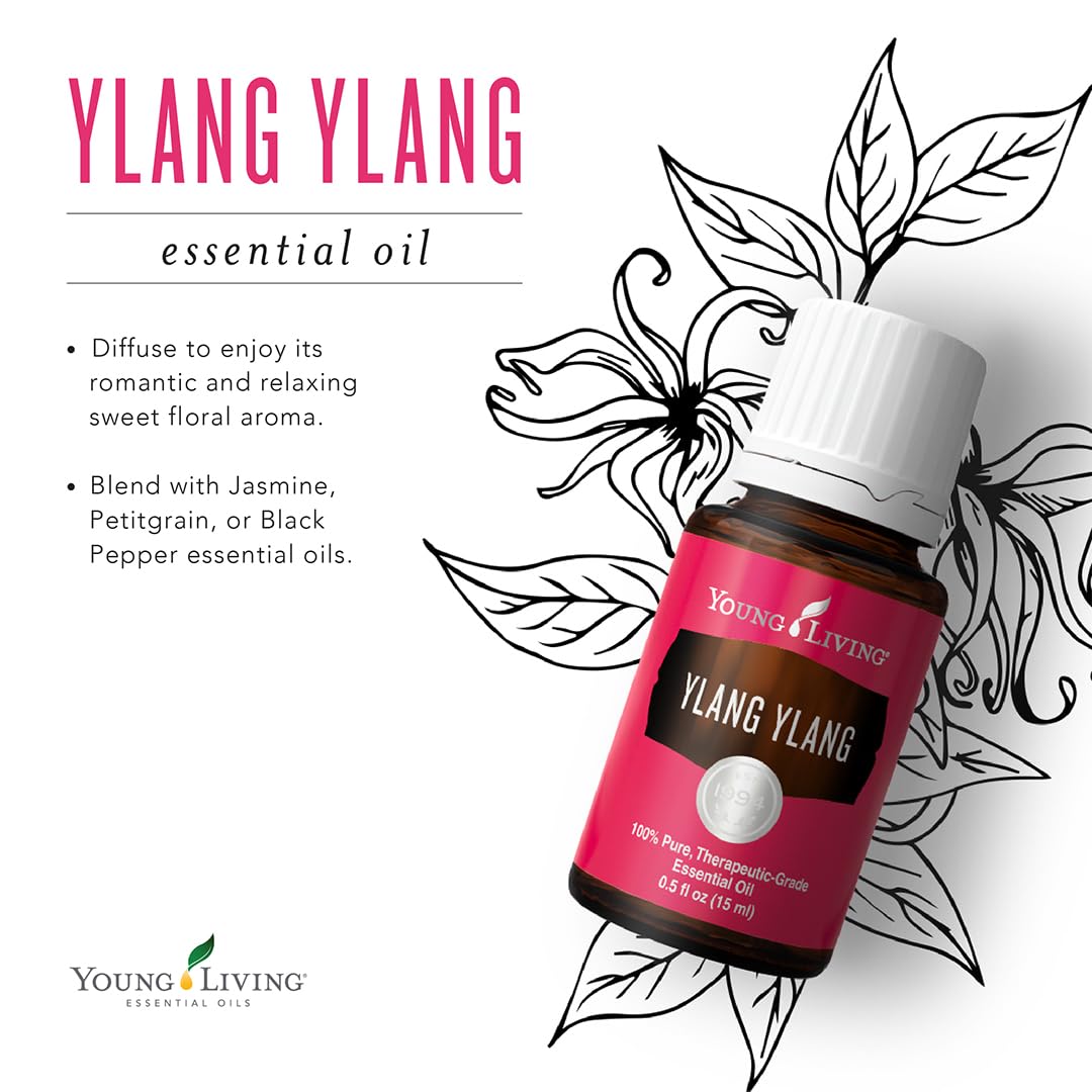 Young Living Ylang Ylang oil being poured for serene ambience.