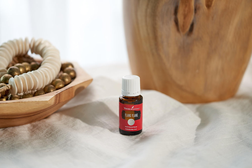 Young Living Ylang Ylang oil on wrist for gentle aromatherapy.