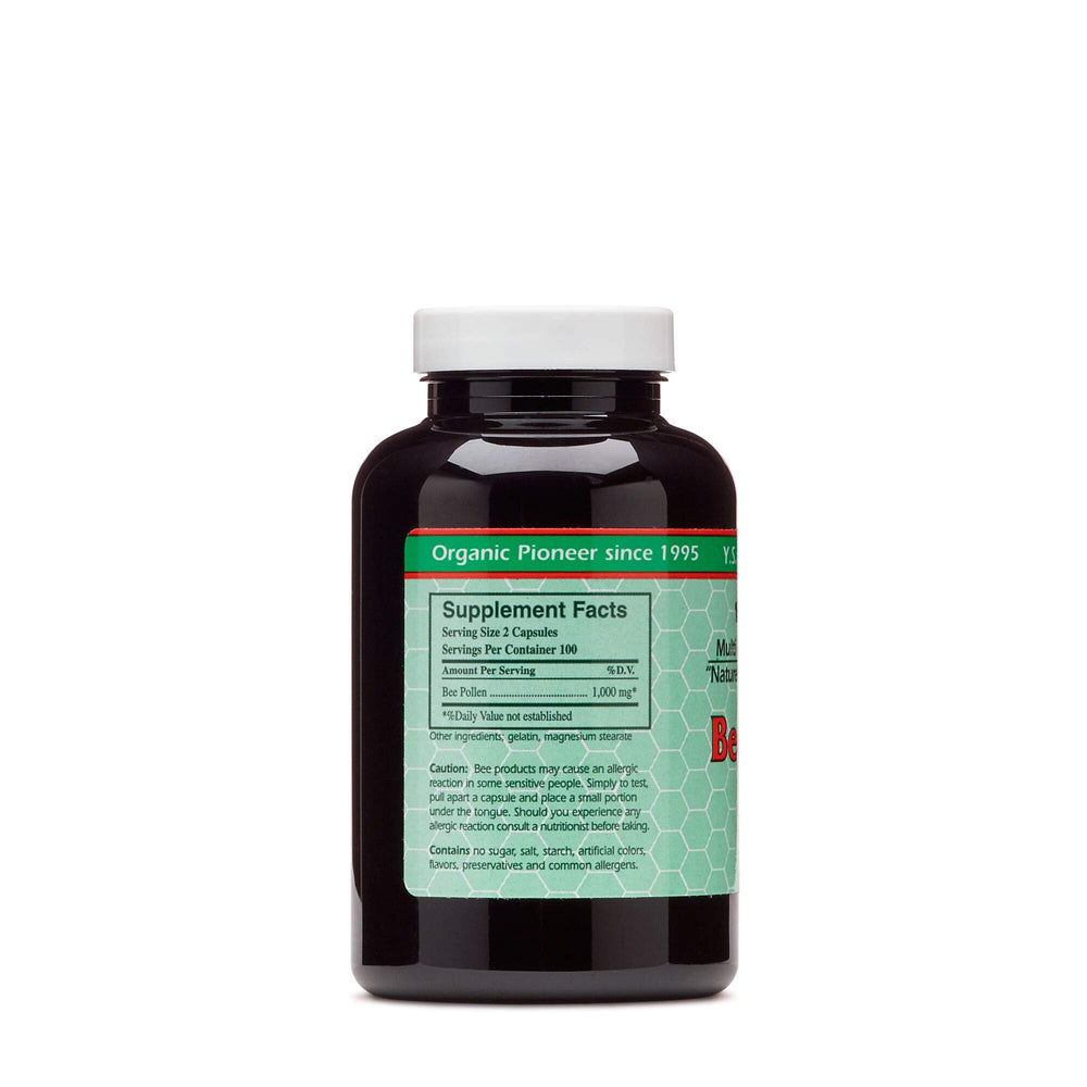 Close-up of bee pollen capsules showing 550 mg each