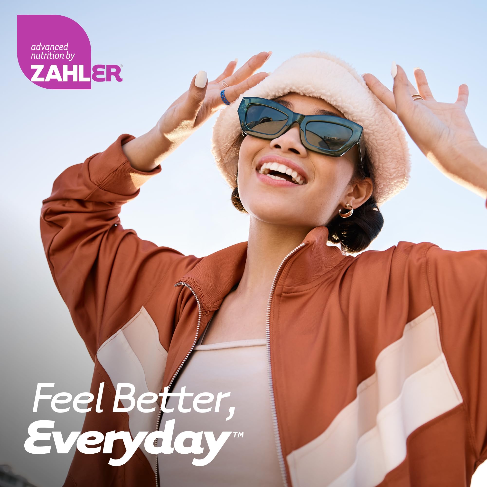 Several L-Lysine capsules spilling from bottle