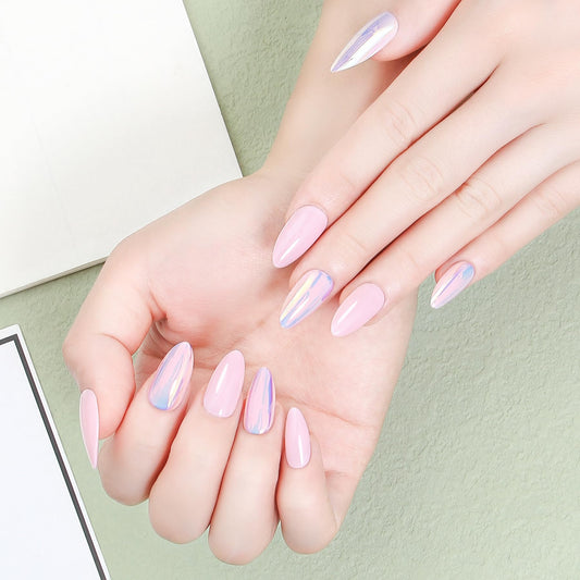 Close-up of ZANVIA iridescent pink glow almond nails sparkling in light