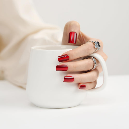 Close-up of ZANVIA Burgundy Cat Eye nails application kit for quick manicures