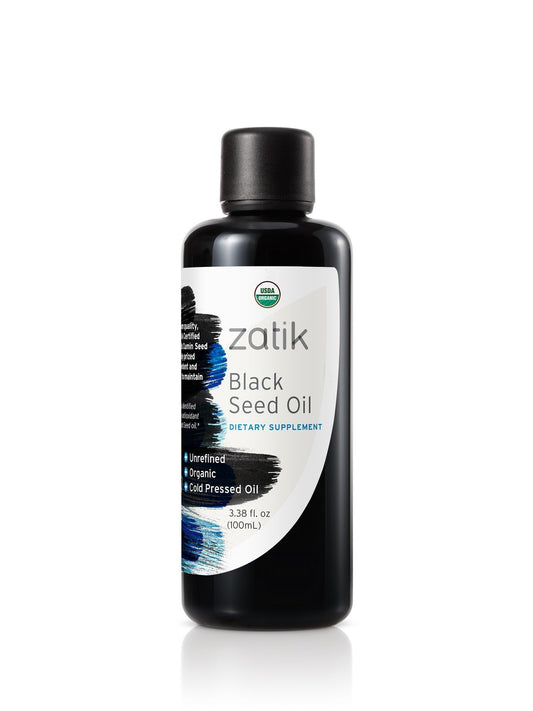 Zatik Naturals Organic Black Cumin Seed Oil bottle in violet UV glass