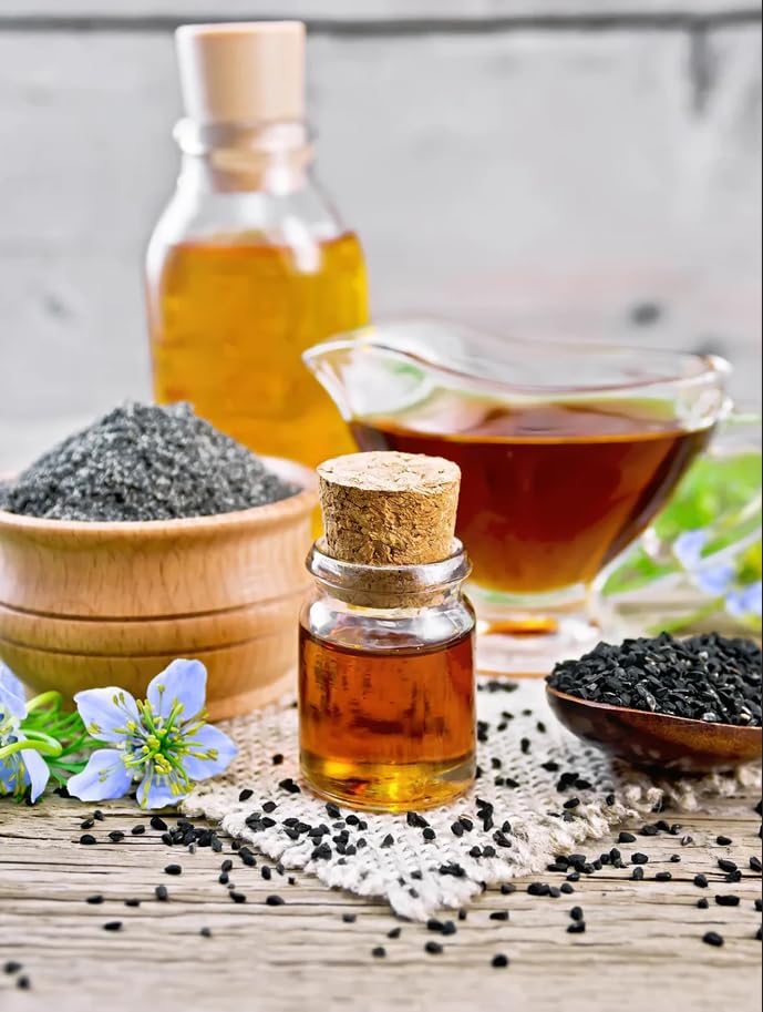 Hair and skin care concept featuring black cumin seed oil