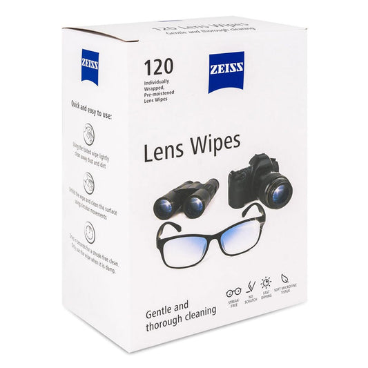 Individually wrapped pre-moistened lens wipe being removed from the box
