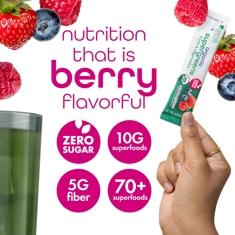 Mixed berry flavor powder in a glass from Zena Nutrition Organic Super Greens.
