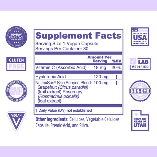 Close-up of Zhou Glowfluence bottle showing label details