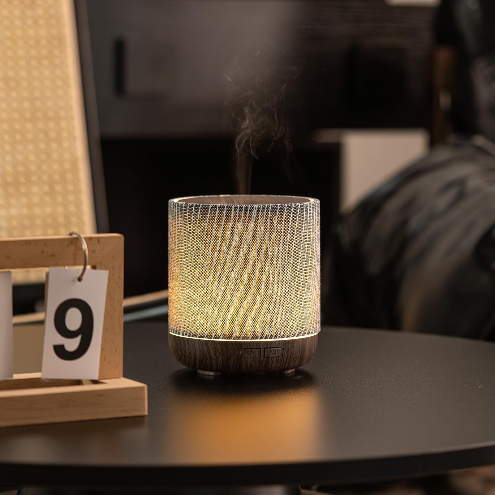 Diffuser on a bedside table highlighting room decor