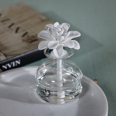 Close-up of Casablanca Lily porcelain flower on diffuser