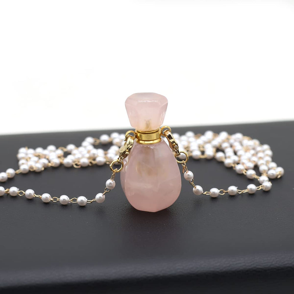 Zotoone rectangle-heart diffuser necklace close-up showing compact essential oil storage.