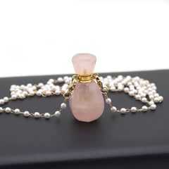 Zotoone rectangle-heart diffuser necklace close-up showing compact essential oil storage.