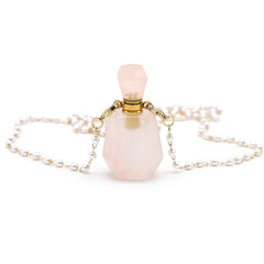 Zotoone rose quartz perfume bottle pendant, crystal centerpiece for daily aromatherapy rituals.